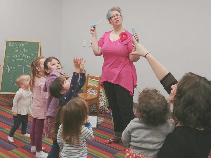 With a deep passion for the French language and having lived in Quebec and France, Teresa Kerr regularly leads a French story time at the Peterborough Public Library in addition to her weekly "Story Time with Mrs. T" at the Silver Bean Cafe in Peterborough's Millennium Park. (Photo: Peterborough Public Library / Facebook)