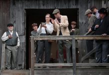 Katie Ryerson as journalist Jean "Jim" Watts and Thomas Fournier as Peterborough union organizer Jim Higgins in a scene from 4th Line Theatre's world premiere of "Jim Watts: Girl Reporter" during a media day event on July 17, 2024 at the Winslow Farm in Millbrook. Written by Beverley Cooper and directed by Kim Blackwell, the play explores the story of the young Canadians who illegally flocked to Spain in the mid-1930s to fight fascism. (Photo: Heather Doughty / kawarthaNOW)