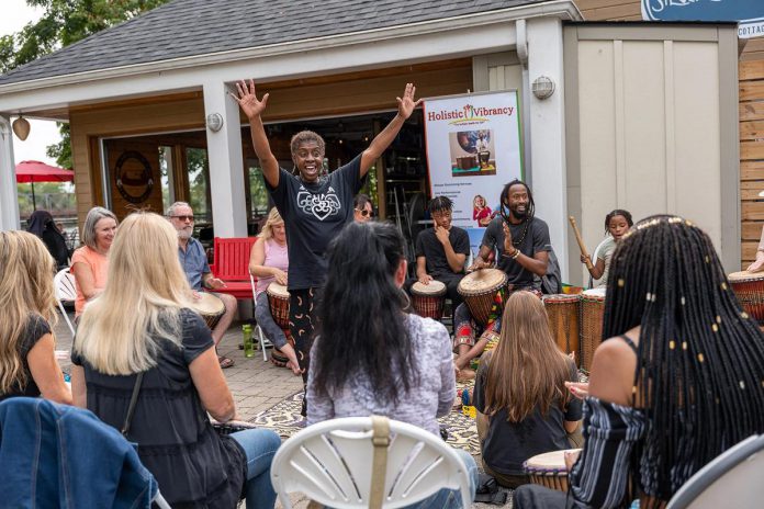A lesson on traditional African drumming during the 2022 launch of the Afrocentric Awareness Network of Peterborough (AANP) at the Silver Bean Cafe in Peterborough's Millennium Park. Describing itself as a "non-profit resource," AANP raises awareness of the positive aspects of Black culture and history through free community events and celebrations. (Photo courtesy of AANP)