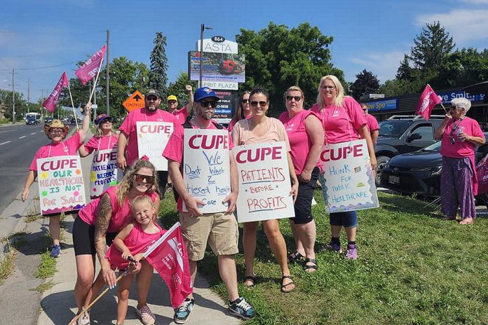 Hospital workers belonging to the Canadian Union of Public Employees (CUPE) gathered outside of Peterborough-Kawartha MPP Dave Smith's constituency office on Chemong Road in Peterborough on July 30, 2024 to protect the Ontario government's use of private clinics to deliver publicly funded health care services previously delivered at public hospitals. (Photo: CUPE's Ontario Council of Hospital Unions / Facebook)