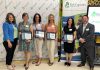 Five Counties Children's Centre board chair Julie Davis (far left) and Centre CEO Scott Pepin (far right) with four of the seven High-Five Community Recognition Awards recipients at the non-profit organization's annual meeting in late June 2024. Five Counties presents the awards each year to deserving individuals and groups that support and share the agency's vision of inclusion. (Photo: Five Counties Children's Centre)