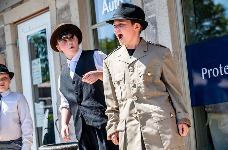 Celebrate Bobcaygeon’s 150th anniversary with Globus Theatre’s sixth annual Downtown Detective Trail Youth participants in Globus Theatre's summer performance camp acting out clues in the 2021 version of the Downtown Detective Trail. (Photo: Dahlia Katz)