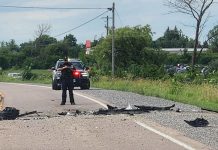 A Kawartha Lakes OPP officer at the scene of a fatal two-vehicle collision on Highway 7 just west of Lindsay on July 16, 2024. (Photo: Kawartha Lakes OPP)