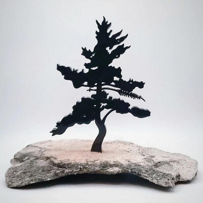 "Silent Lake" (2024, wonderstone, pyrophyllite, on granite base) by Nick Leniuk, a Peterborough-based stone sculptor. At Tour Stop 8 during the 40th anniversary Kawartha Autumn Studio Tour on September 28 and 29, 2024, Leniuk will be one of many artists doing live demonstrations, showing the intricate process of stone carving by hand. (Photo courtesy of the Art Gallery of Peterborough)