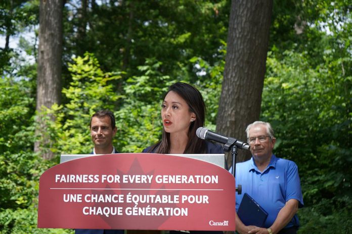 Federal small business minister Rechie Valdez was at Jackson Park in Peterborough on July 18, 2024 on behalf of environment and climate change minister Steven Guilbeault to announce over $8.5 million in federal funding for two projects that will help advance conservation efforts and protect ecosystems in Peterborough and the Kawarthas, including $7 million for Kawartha Land Trust. Also pictured is Guilbeault's parliamentary secretary Adam van Koeverden and Peterborough mayor Jeff Leal. (Photo: Office of Rechie Valdez)