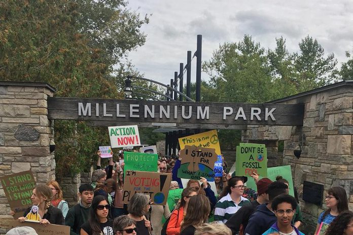 Peterborough youth leading a march as part of the Global Climate Strike protest on September 27, 2019. Kawartha World Issues Centre (KWIC) and For Our Grandchildren (4RG) are partnering for a new initiative that aims to bring Peterborough youth and seniors together and cultivate intergenerational solidarity for collective action to address climate change in the local community. (Photo: Leif Einarson)