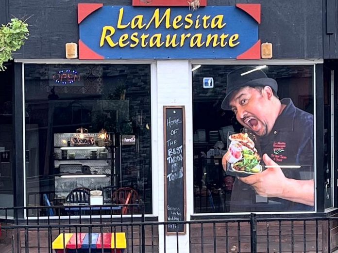 Chef Martin Carbajal pictured in the window of La Mesita Restaurante at 247 George Street North in downtown Peterborough. Chef Martin, who owns the award-winning restaurant alongside his wife Kelly, serves the authentic Mexican cuisine on which he was raised while growing up in Mexico City. Not only is he expanding the restaurant's menu, but La Mesita can also be found at four local farmers' markets, and Chef Martin also offers catering for events of all sizes, with customizable menus beyond Mexican fare. (Photo courtesy of La Mesita Restaurante)