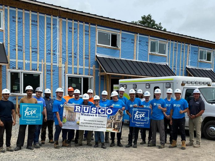 Rusco Windows & Doors recently pitched in to help Habitat for Humanity Northumberland at its multi-unit housing build in Baltimore. The Cobourg company is also hosting a fundraising golf tournament in September to benefit the organization. (Photo: Habitat for Humanity Northumberland / Facebook)