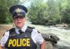 Sergeant Natalie Majer of the Haliburton Highlands Ontario Provincial Police (OPP) at Minden Wild Water Preserve where a woman was rescued on July 4, 2024 after falling into the water and being swept away by the current. (kawarthaNOW screenshot of OPP video)