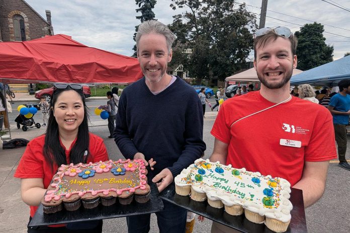 New Canadians Centre executive director Andy Cragg (centre) with team members during the non-profit organization's 45th anniversary block party outside its offices in Peterborough on June 28, 2024. The organization exceeded its 45th anniversary fundraising campaign goal of raising $45,000 and, as a result of an anonymous donor matching the amount raised up to $45,000, the campaign has actually netted $93,507. (Photo: New Canadians Centre / Facebook)