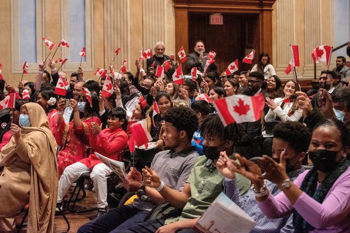 Prior to the 2024 Northumberland Diversity Festival, more than 100 new Canadians to Northumberland and surrounding communities will take their oath of citizenship during a ceremony at 10 a.m. at the Capitol Theatre in Port Hope. Pictured are newcomers celebrating their citizenship in 2022 at Victoria Hall in Cobourg. (Photo: NHCC)