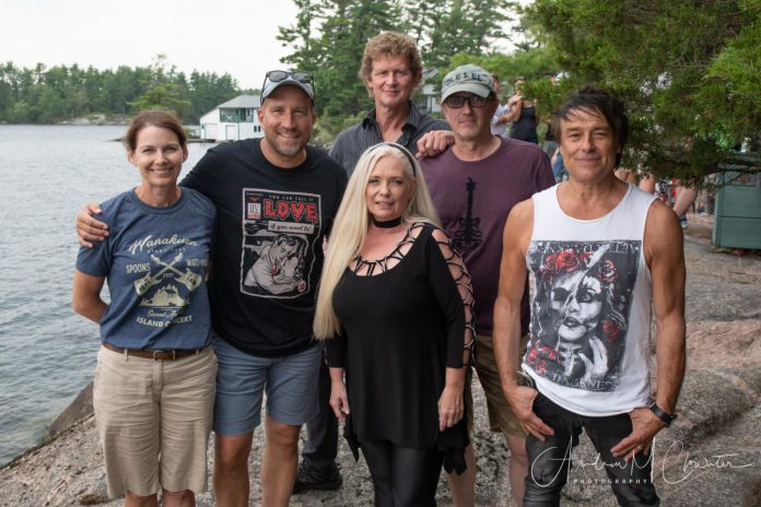 Susan and Bruce Hodges (left) with members of Canadian new wave band Spoons in 2021, when they returned for the second year to perform at the annual Wanakuen Concert on the Hodges' Stoney Lake property to raise funds for Ronald McDonald House Charities (RMHC) Toronto. (Photo: Andrew Clowater)