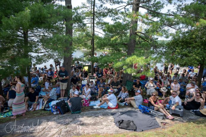 Some of the around 300 invited guests for the fifth annual Wanakuen Concert on July 13, 2024 at Bruce and Susan Hodges' Stoney Lake property, which featured Canadian rock bands 54-40 and Chalk Circle with Nashville-based singer-songwriter Leah Marlene opening. (Photo: Andrew Clowater)