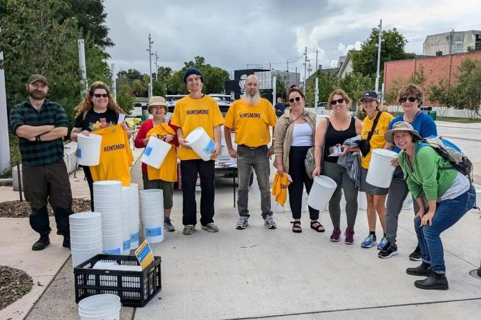 Clean Up Peterborough founder Steve Paul (fifth from left) with volunteers who gathered on July 14, 2024 to help clean up Millennium Park, Del Crary Park, and a large section of the Little Lake shoreline in Peterborough. The volunteer-run group is hosting another four community clean-up events in September in Peterborough. (Photo courtesy of Steve Paul)