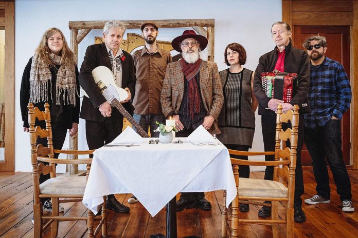 The Grievous Angels, led by Charlie Angus (second from left), a seven-piece alt-folk country band who have been performing and recording since 1986 and recently released their ninth album. The band will be performing a benefit concert at the Haliburton Forest and Wild Life Reserve Logging Museum on August 31, 2024 in support of Places for People, a non-profit organization dedicated to creating affordable rental housing in Haliburton County. (Photo: Paul Rincon)