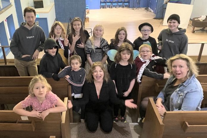 This fall, the Peterborough Academy of Performing Arts (PAPA) is offering eight-week improv classes for kids of all ages. Led by founder Linda Kash (kneeling) and other local performing artists, the classes will cover the foundations of improv using easy-to-learn games and teamwork-building exercises. (Photo courtesy of PAPA)