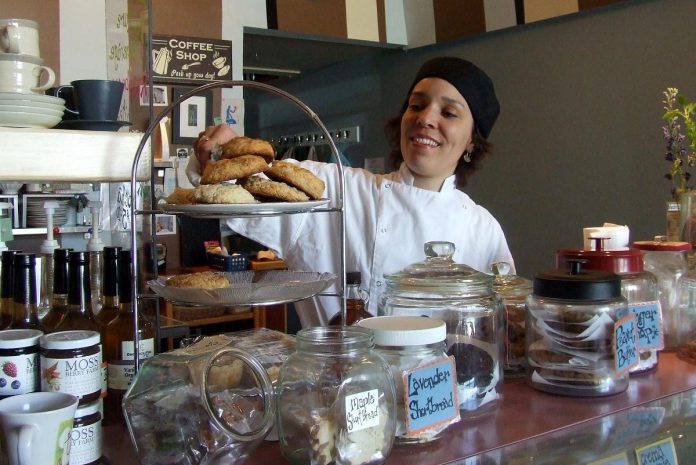 Lisa Dixon in 2011 with her famous scones. She opened Blackhoney Desserts and Coffeehouse in 2005 shortly after moving to Peterborough and sold the business in 2023. She is now working on a cookbook with recipes and stories from almost 20 years of Blackhoney. (Photo courtesy of Blackhoney)