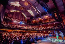 Nobu Adilman and Daveed Goldman of Choir! Choir! Choir! leading the audience at Toronto's Massey Hall. The pair will be at Peterborough Musicfest in Del Crary Park on August 14, 2024 for an epic sing-along of some of the biggest hits of the 1980s. (Photo: Joseph Fuda)