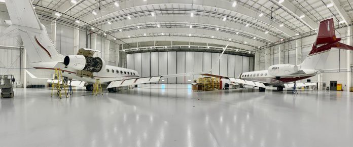 One of the 22 businesses operating out of the Peterborough Airport, Flying Colours Corp. specializes in maintaining, refurbishing, and overhauling business jets. The magic happens in spacious hangars large enough to house Airbus A220 or Boeing 737 aircraft types. (Photo: Flying Colours Corp.)