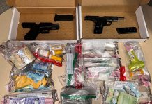 Peterborough police have charged three people with drugs and weapons offences after seizing two loaded handguns, 177 grams of fentanyl, 55 grams of cocaine, 122 Dilaudid pills (hydromorphone), and over $3,000 in Canadian currency during a search of a Peterborough residence on August 9, 2024. (Police-supplied photo)