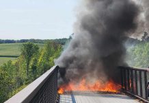 A fire on the decking of Doube's Trestle Bridge along the Kawartha Trans Canada Trail between Peterborough and Omemee on September 4, 2024. (Photo: WS via Facebook)