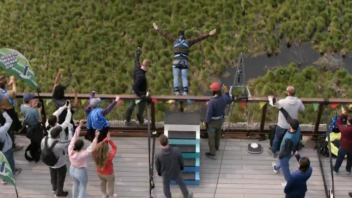 A character bungee-jumps off Doube's Trestle Bridge in a scene from "Mr. Monk's Last Case: A Monk Movie" now streaming on Amazon Prime Video. (kawarthaNOW screenshot)