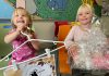 Five Counties Children's Centre kids Payton and her sister Paisley are excited about the first-ever "Couture for Kids" fashion show fundraiser taking place on October 3, 2024 in Lindsay. The event will raise funds to support services for Five Counties kids in the City of Kawartha Lakes. (Photo courtesy of Five Counties Children's Centre)