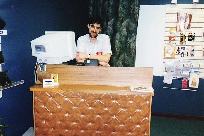 A young Tony Grady behind the desk at Grady's Shoes at 386 George Street North in 1997 after purchasing the business from his father. An entrepreneur from a young age, Tony began working at his father's business as a teenager. (Photo courtesy of Grady's Feet Essentials)