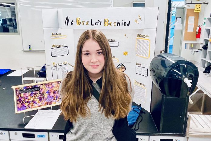 One of three Kawartha youth heading to the International Meeting for Young Beekeepers in Dubai in the United Arab Emirates from December 18 to 21, 2024, 15-year-old Heidi Westbye of Cavan has been beekeeping since 2017. Her passion led her to win third place in the Earth and Environmental Sciences class of the 2024 Peterborough Science Fair for a project on honeybees. (Photo courtesy of Kawartha Junior Beekeepers)