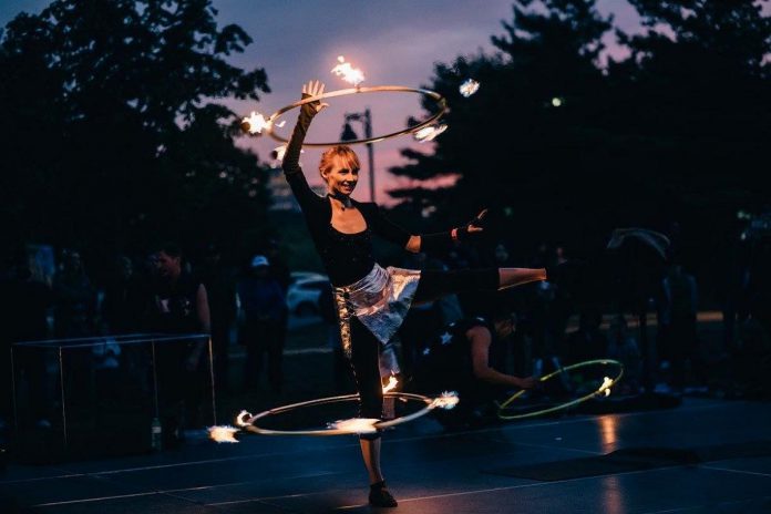 In a first for Millbrook's annual Fall Festival on October 5, 2024, Isabella Hoops of NorthFIRE Circus will perform an interactive hula hoop and fire show for adults and children. (Photo courtesy of Isabella Hoops)