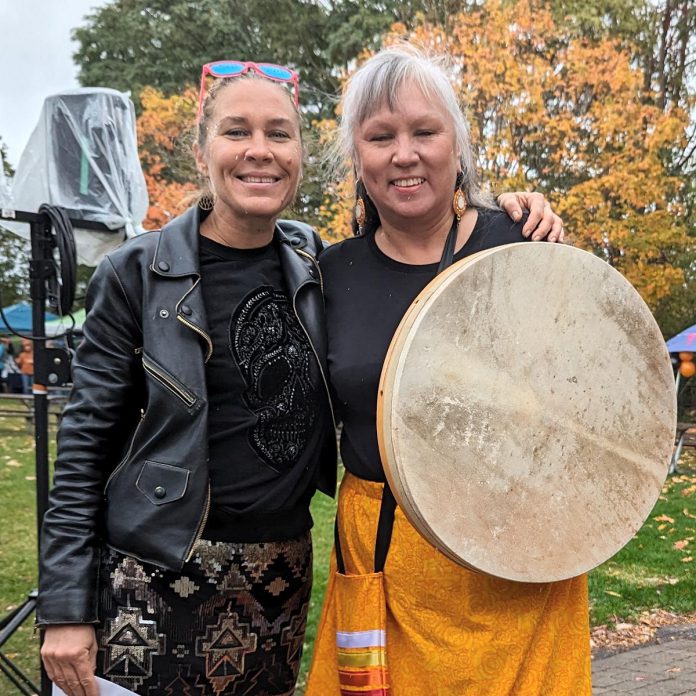 Monarch Ultra co-founder Carlotta James with Janet McCue of the Wshkiigomang Native Women's Hand Drum Singers from Curve Lake First Nation during the inaugural Monarch Butterfly Festival and Run in October 2023. (Photo courtesy of Monarch Ultra)