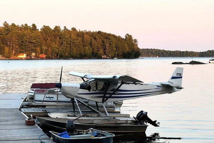 This pontoon plane crashed into Catchecoma Lake and sank on September 11, 2024. Witnesses rescued the pilot and passenger who were uninjured. (Police-supplied photo)