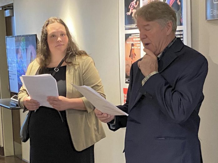 Public Energy executive director Bill Kimball, accompanied by managing director Eva Fisher, announced the performing arts facilitator's 31st season at the Market Hall in downtown Peterborough on September 24, 2024. (Photo: Paul Rellinger / kawarthaNOW)