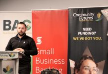 Scotiabank small business advisor Kevin Miller speaks at Community Futures Peterborough's 2024 ScaleUP graduation celebration at Venture North in downtown Peterborough on September 17, 2024. The celebration was in honour of the third cohort of the program, and the second one held in partnership with Scotiabank. By supporting individual small businesses through programs like ScaleUP, Scotiabank is also supporting broader economic development by creating jobs, increasing local spending, and fostering a culture of entrepreneurship. (Photo: Jeannine Taylor / kawarthaNOW)