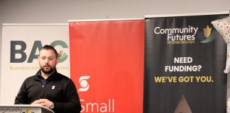 Scotiabank small business advisor Kevin Miller speaks at Community Futures Peterborough's 2024 ScaleUP graduation celebration at Venture North in downtown Peterborough on September 17, 2024. The celebration was in honour of the third cohort of the program, and the second one held in partnership with Scotiabank. By supporting individual small businesses through programs like ScaleUP, Scotiabank is also supporting broader economic development by creating jobs, increasing local spending, and fostering a culture of entrepreneurship. (Photo: Jeannine Taylor / kawarthaNOW)