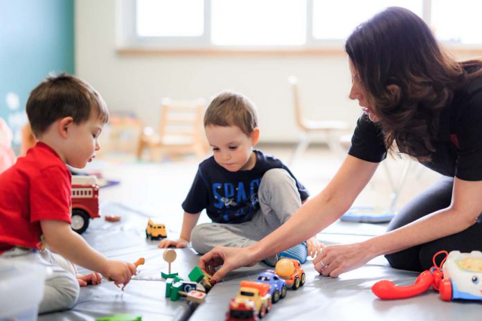 Two young boys and an adult at a child care centre. (Photo: Sally LeDrew Pictures by Sally LeDrew Salleeco Stock)