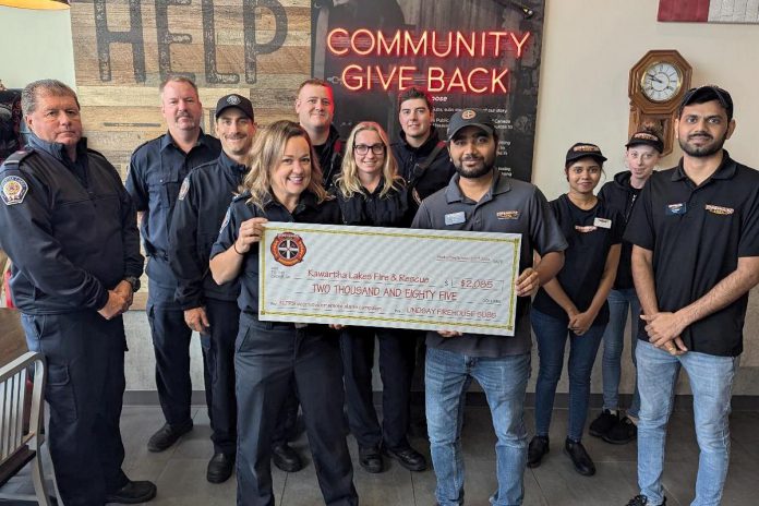 Members of Kawartha Lakes Fire Rescue Service's Lindsay fire station, along with the fire prevention and education team members, accept a cheque for $2,085 from Firehouse Subs Lindsay in support of the fire service's door-to-door smoke alarm program. (Photo: City of Kawartha Lakes)