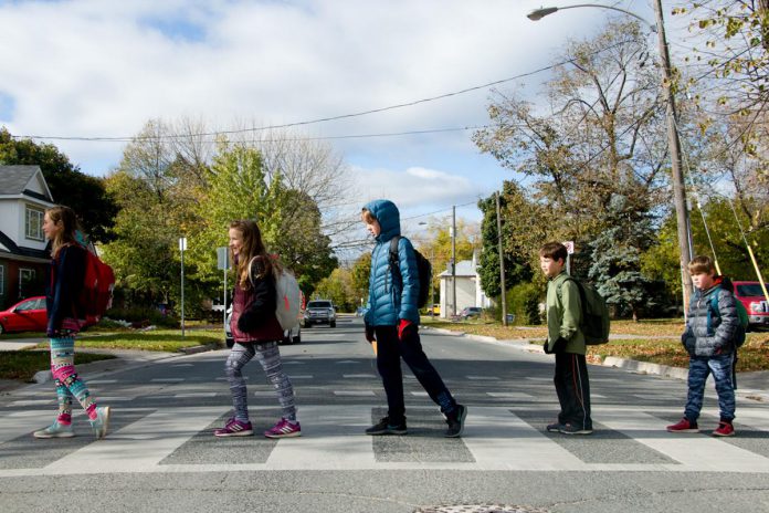 "Walktober" is an opportunity to spend time outside and encourage kids, students, families, and school communities to be active on the way to school. Kids who walk to school benefit from more quality time with friends, lower stress, and increased daily minutes of exercise. (Photo: Peter Rellinger)