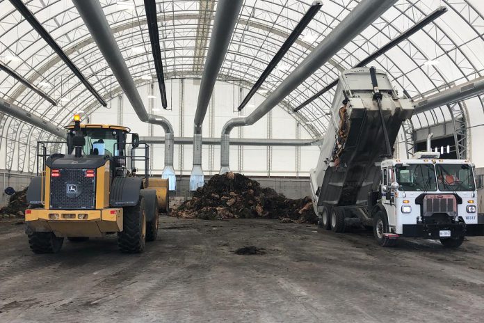 After collection, curbside organics are dumped from collection trucks and mixed inside the receiving building at the city-county landfill site located on Bensfort Road. (Photo: City of Peterborough)