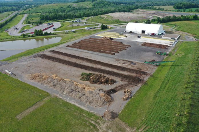 An aerial photo of the City of Peterborough's composting facility in the foreground, on a site shared with the city-county landfille in the background. Separating organics from garbage has brought the overall diversion rate to more than 75 per cent and increased the life expectancy of the city-county landfill by almost three years. (Photo: City of Peterborough)