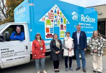 Habitat for Humanity Peterborough and Kawartha Region (Habitat PKR) unveiled its new ReStore truck on October 25, 2024 during Waste Reduction Week. The truck, which was funded through a capital grant from the provincial government's Ontario Trillium Foundation, will allow the non-profit organization to collect more donated items to be sold in its three ReStores. Pictured from left to right are Habitat PKR's procurement manager Mario Zambonin, Habitat PKR board chair Hope Lee, Habitat PKR CEO Susan Zambonin, Ontario Trillium Foundation volunteer Klara Oyler, Peterborough-Kawartha MPP Dave Smith, and Habitat PKR communications and marketing manager Holly O'Conner. (Photo courtesy of Habitat PKR)