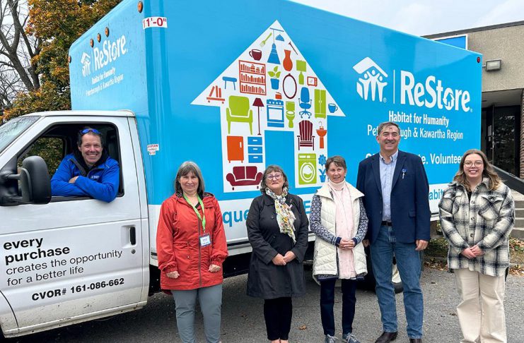 Habitat for Humanity Peterborough and Kawartha Region (Habitat PKR) unveiled its new ReStore truck on October 25, 2024 during Waste Reduction Week. The truck, which was funded through a capital grant from the provincial government's Ontario Trillium Foundation, will allow the non-profit organization to collect more donated items to be sold in its three ReStores. Pictured from left to right are Habitat PKR's procurement manager Mario Zambonin, Habitat PKR board chair Hope Lee, Habitat PKR CEO Susan Zambonin, Ontario Trillium Foundation volunteer Klara Oyler, Peterborough-Kawartha MPP Dave Smith, and Habitat PKR communications and marketing manager Holly O'Conner. (Photo courtesy of Habitat PKR)