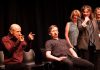 Kerry Griffin performs an unconventional kind of therapy on Mark Rostrup as Janet Van Der Graaff, Linda Kash, and Naomi Snieckus look on during klusterfork's "School's Out!" improv show at the Market Hall in July 2023. Griffin and Van Der Graaff are two of the improv professionals who will perform in klusterfork's "Impros vs. Joes" improv comedy show at the Gordon Best Theatre in downtown Peterborough on November 15, 2024, along with klusterfork's "Keep Me Up" improv workshop students. (Photo: Andy Carroll)