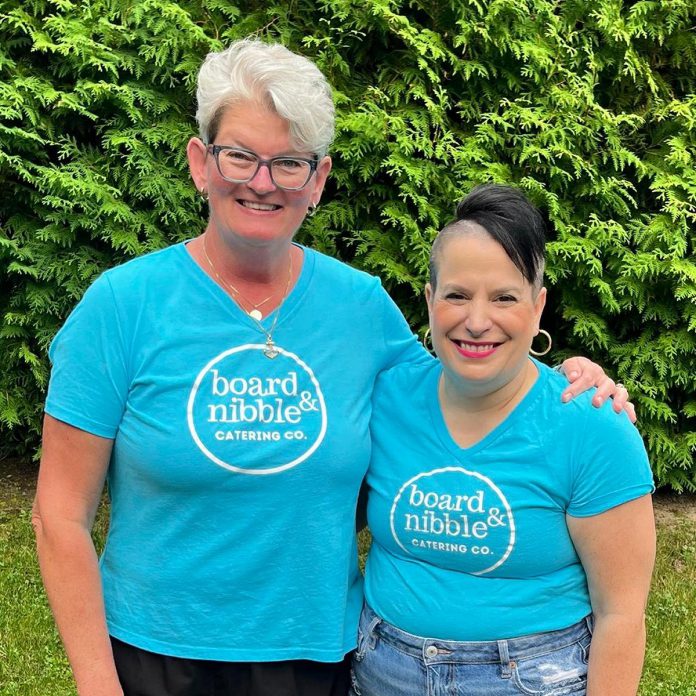 Charlene Vanderburg and Tammy Thurston are the owners of Lindsay's Board & Nibble Catering Co., which the duo launched just over a year ago after rekindling their friendship. To reduce food waste, the business turns unused and uneaten food into affordable and pay-what-you-can homecooked meals for the community through their Making Meals Matter Kawartha Lakes project. (Photo: Kelsey McDonald)