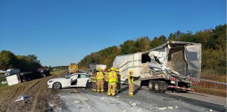 A collision involving a passenger vehicle and three tractor-trailers closed the westbound lanes of Highway 401 at Brighton for around three hours on October 4, 2024. The driver of the passenger vehicle suffered minor injuries. (Photo: Northumberland OPP)