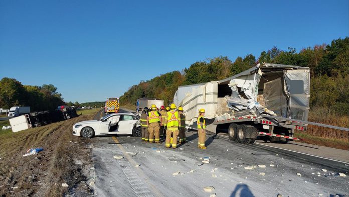 A collision involving a passenger vehicle and three tractor-trailers closed the westbound lanes of Highway 401 at Brighton for around three hours on October 4, 2024. The driver of the passenger vehicle suffered minor injuries. (Photo: Northumberland OPP)