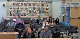 Transition House board chair Meaghan MacDonald and executive director Ike Nwibe address Northumberland County Council during a special county council meeting on October 29, 2024. With a 2024 bylaw around the regulation of emergency care establishments now in place in Cobourg, Transition House may be forced to close its doors to additional guests or reduce its occupancy at its Chapel Street location. (kawarthaNOW screenshot of Northumberland County video)