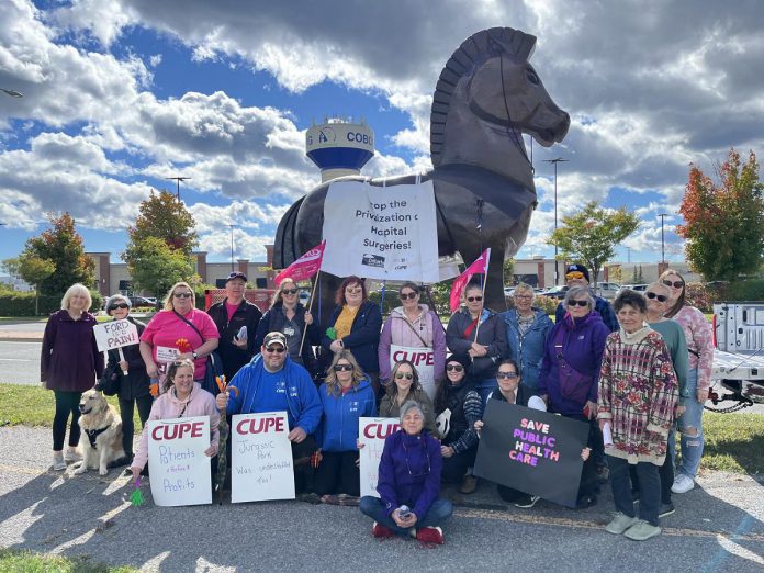 CUPE's Ontario Council of Hospital Unions (OCHU-CUPE) and the Ontario Health Coalition's Trojan Horse visited Northumberland Hills Hospital in Cobourg on October 8, 2024. The statue is visiting hospitals and other locations around Ontario until the end of November to protest privatization of hospital surgeries. (Photo: OCHU-CUPE)