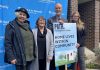 Peterborough Action for Tiny Homes (PATH) chair Trish Campbell, Habitat for Humanity Peterborough and Kawartha Region CEO Susan Zambonin, PATH land acquisition working group lead Keith Dalton, and Habitat for Humanity communications and donor services manager Jenn MacDonald outside Habitat for Humanity's Milroy Drive location on April 25, 2023, when it was announced that Habitat would lease the former Peterborough Humane Society property at 385 Lansdowne Street to PATH for a sleeping cabin community. (Photo: Paul Rellinger / kawarthaNOW)