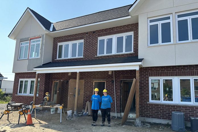 High school students participating in the Build & Soar Program at Habitat for Humanity Peterborough & Kawartha Region's 12-unit affordable condo development at 21 Leahy's Lane in Peterborough. In a win-win situation, students in the program gained one-on-one support and mentorship while employers were given a 50 per cent wage subsidy upon completion of the program. (Photo courtesy of Peterborough & the Kawarthas Economic Development)